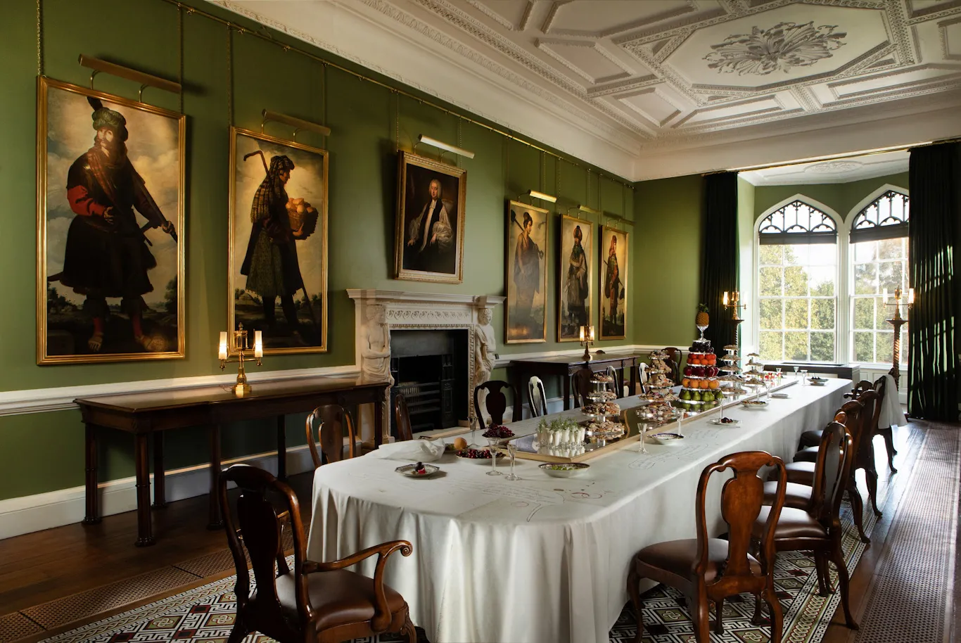 Long dining room in Auckland Castle with paintings
